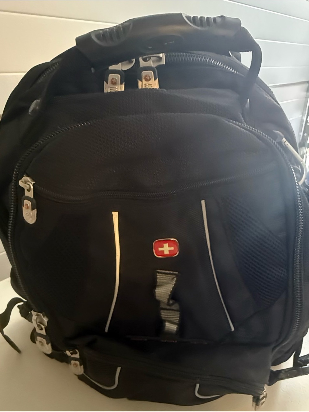 Swiss Gear Black Men’s Travel Backpack with Red Cross Accent